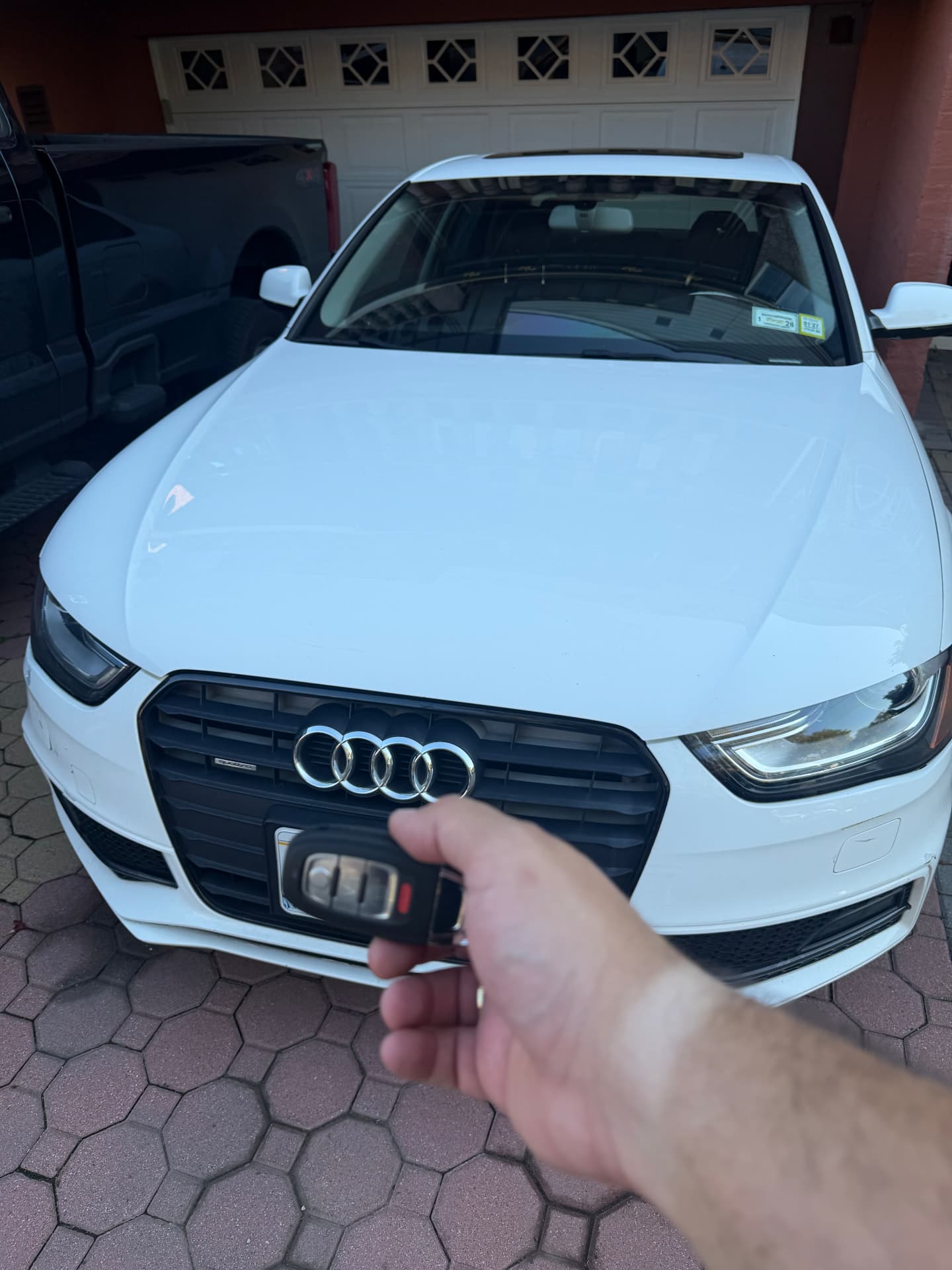 Audi key fob replacement in a driveway